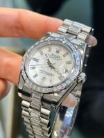 Rolex Datejust 31mm Osytersteel Bracelet White MOP Dial Lady Baguette Watch